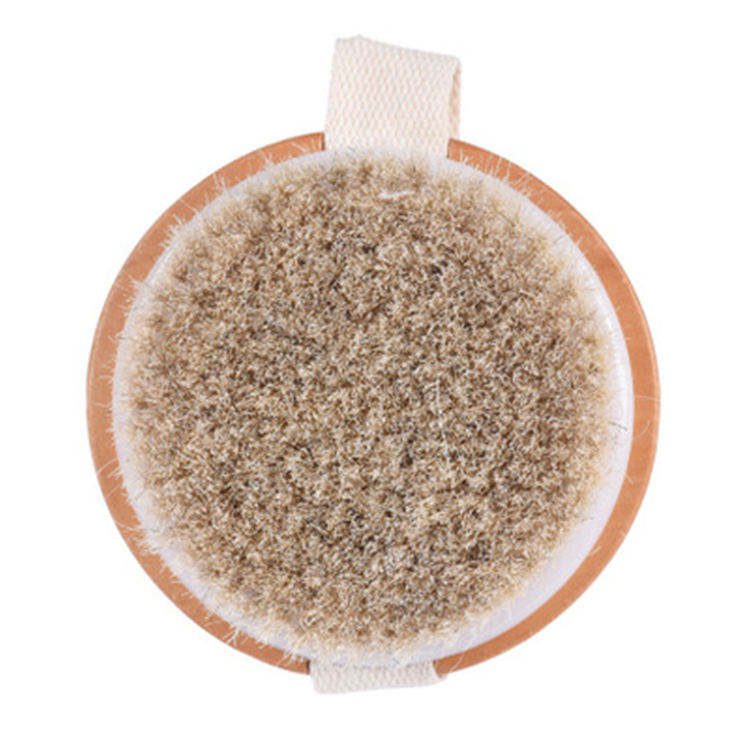 Round handheld body brush with boar bristles and strap for dry brushing and shower exfoliation