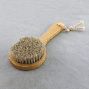 Wood handle body brush with natural bristles and pouch for dry skin exfoliation and shower use