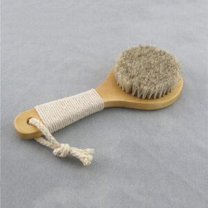 Wood handle body brush with natural bristles and pouch for dry skin exfoliation and shower use