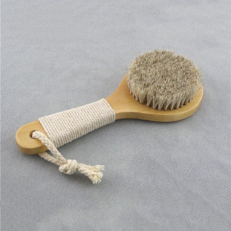 Wood handle body brush with natural bristles and pouch for dry skin exfoliation and shower use