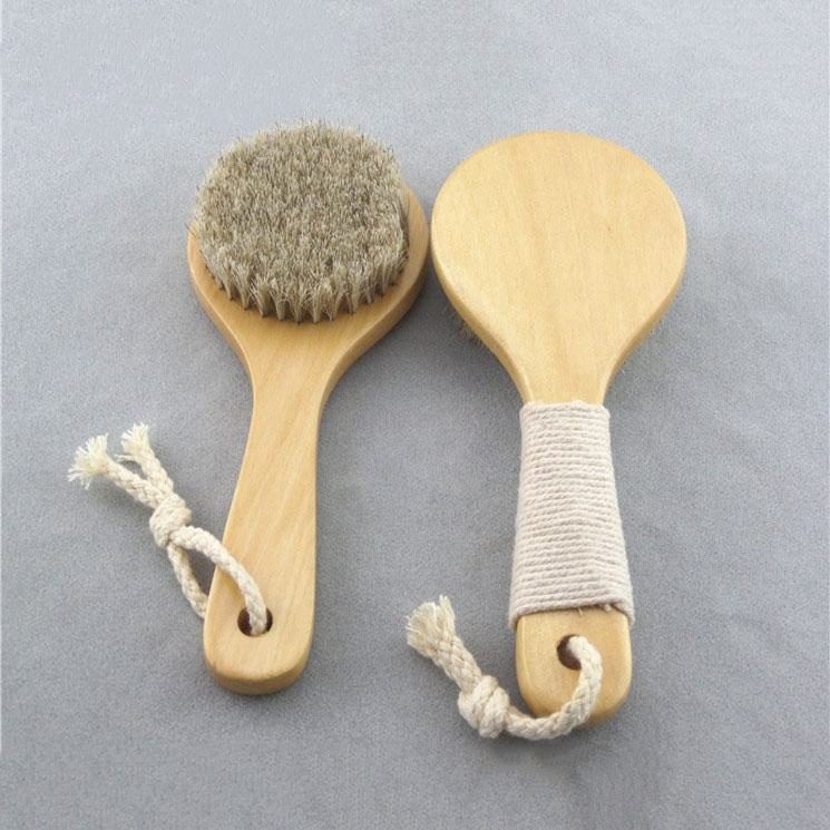Wood handle body brush with natural bristles and pouch for dry skin exfoliation and shower use