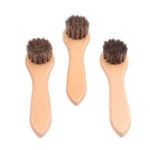 small wooden horsehair cleaning brushes for shoe polishing and leather care