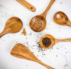 teak wood skimmer spoon with holes for cooking draining and serving food