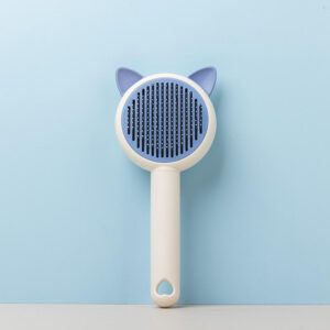 green self cleaning pet grooming brush with stainless steel pins for dogs and cats