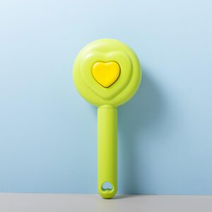 green self cleaning pet grooming brush with stainless steel pins for dogs and cats