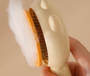 self cleaning pet grooming brush with stainless steel pins for cats and dogs