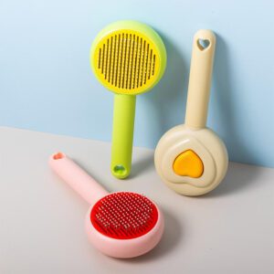 green self cleaning pet grooming brush with stainless steel pins for dogs and cats