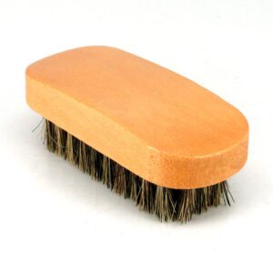 small portable wooden shoe brush with soft horsehair bristles for shoe polishing and travel cleaning