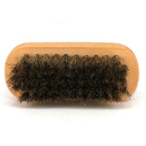 small portable wooden shoe brush with soft horsehair bristles for shoe polishing and travel cleaning
