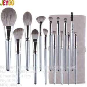 14-piece synthetic hair makeup brush set with champagne silver handles, including face brushes, eye shadow brushes, powder brushes, blush brushes, concealer brushes, and a portable brush case.