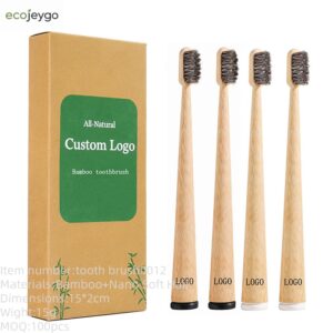 Four-piece bamboo toothbrush set with natural horse hair and boar bristle brush heads, custom logo bamboo handles, and eco-friendly kraft paper packaging for sustainable oral care