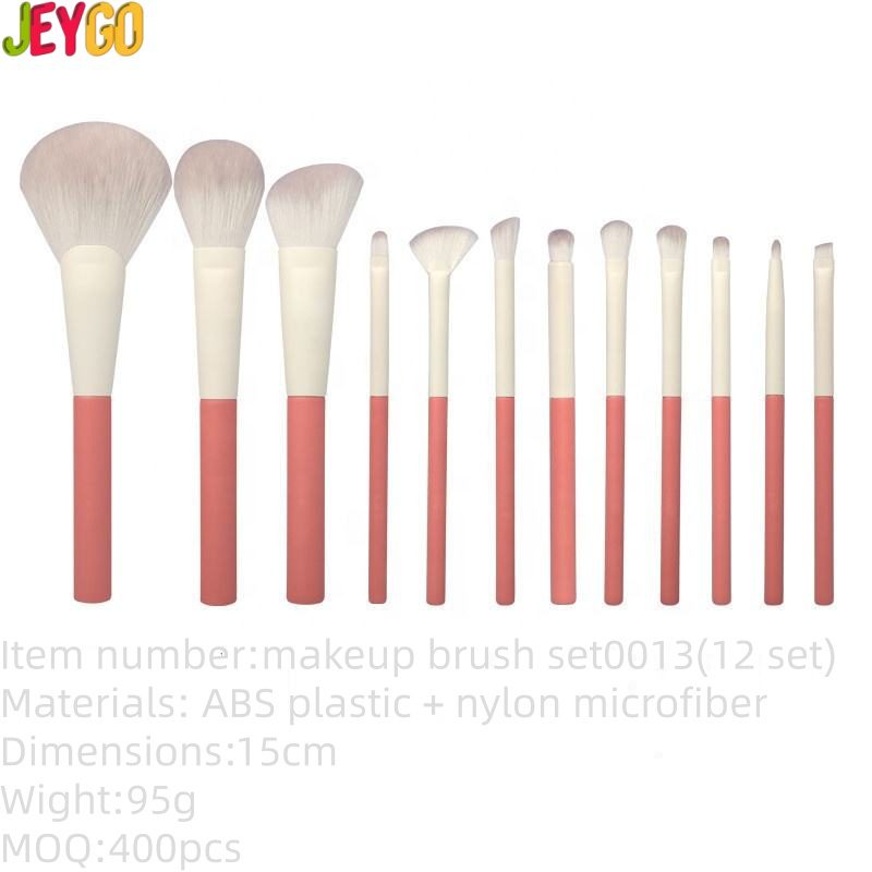 12-piece professional makeup brush set with pink and white handles, featuring synthetic hair brushes for face makeup, concealer, eyeshadow, mascara, blending, and fan brush application.
