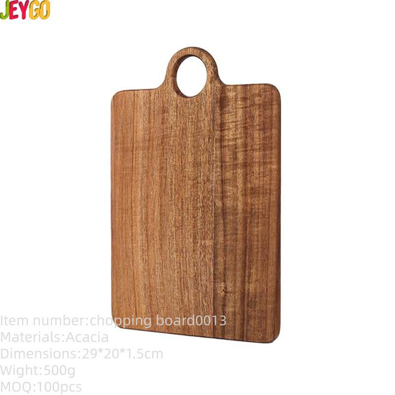 rectangular acacia wood cutting board with integrated hanging handle for chopping, serving, and food presentation