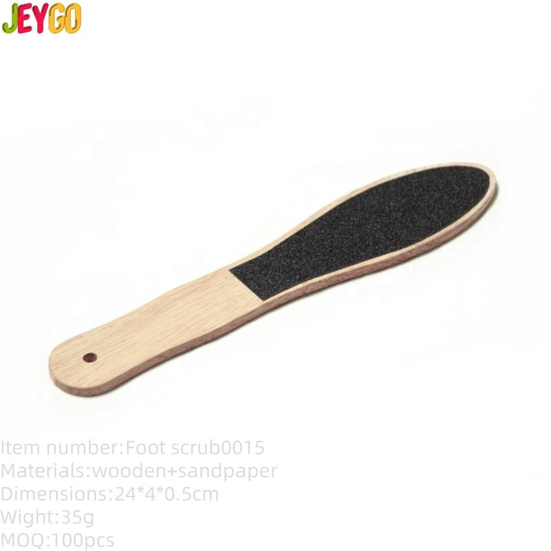 Double-faced wooden pedicure foot scrub with sandpaper surface for callus removal and smooth feet care.