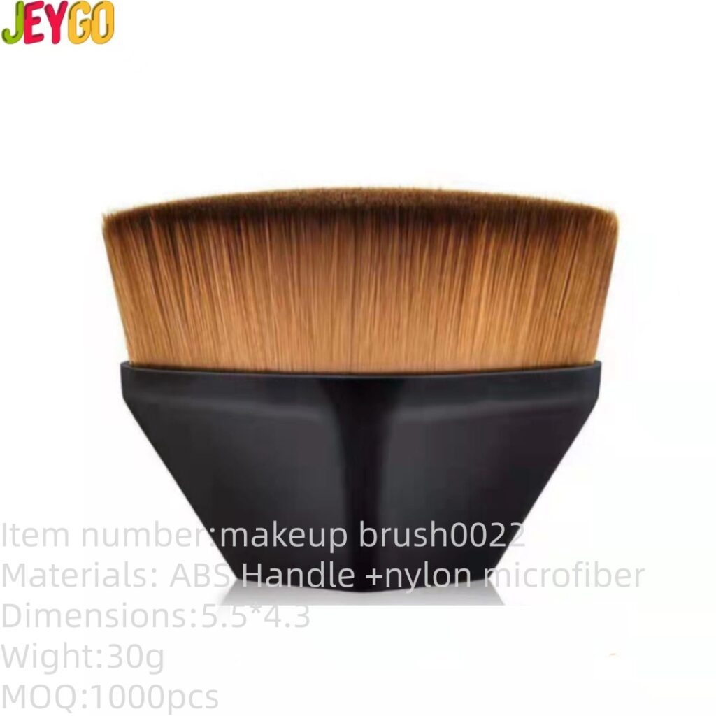 Portable magic foundation brush with dense synthetic bristles and ergonomic black handle, designed for foundation, contouring, concealer blending, and flawless makeup application.