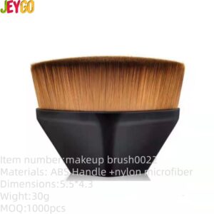 Portable magic foundation brush with dense synthetic bristles and ergonomic black handle, designed for foundation, contouring, concealer blending, and flawless makeup application.