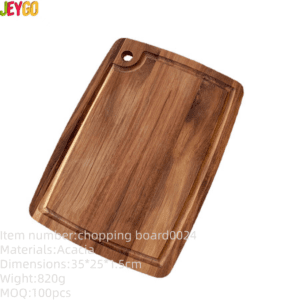 Rectangular acacia wood cutting board with built-in juice groove and hanging hole, ideal for chopping fruits, vegetables, and meats, suitable for kitchen use and serving