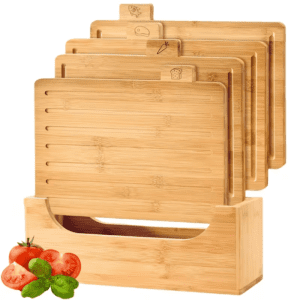 multi-piece bamboo cutting board set with storage holder and food category tabs for organized kitchen use