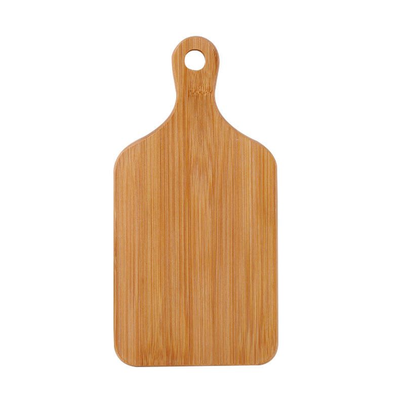 large bamboo cutting board with rounded handle and hanging hole for food preparation and serving