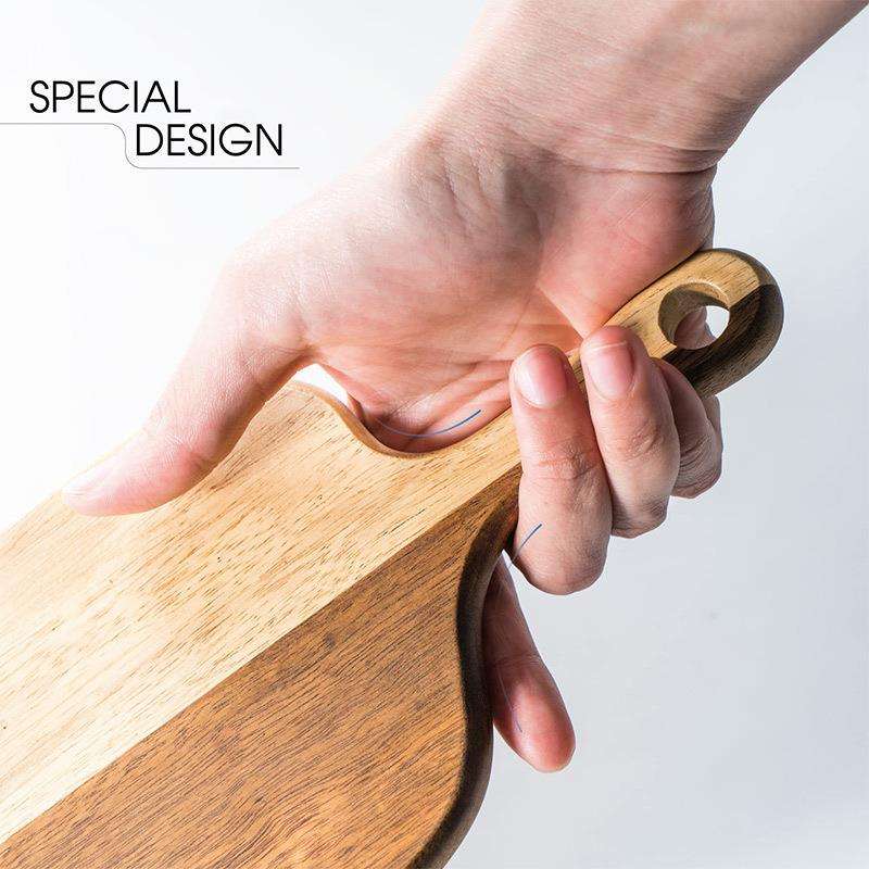 Rectangular acacia wood cutting board with handle, ideal for serving cheese, charcuterie, bread, and fruits, suitable for home kitchens and restaurants
