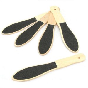 Double-faced wooden pedicure foot scrub with sandpaper surface for callus removal and smooth feet care.
