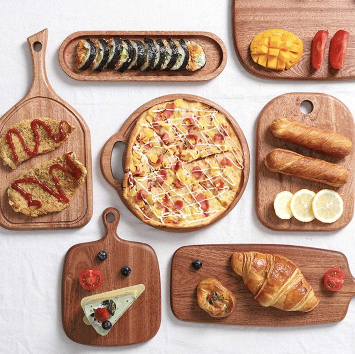 rectangular acacia wood cutting board with integrated hanging handle for chopping, serving, and food presentation