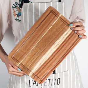 rectangular acacia wood cutting board with juice groove for chopping meat, vegetables, pizza, and food preparation