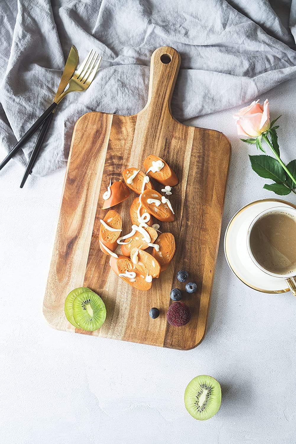 acacia wood cutting board with handle for pizza serving, cheese presentation, bread display and food preparation