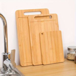 natural bamboo cutting board with built-in handle and juice groove for chopping, slicing and serving food