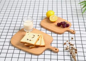 Two solid beech wood cutting boards with handles, ideal for slicing fruit, bread, and pizza, suitable for home baking, kitchen prep, and serving