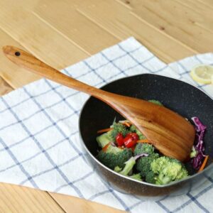 Set of five natural acacia wood kitchen utensils including spatulas, slotted spoons, and stirring tools, designed for non-stick cookware and home cooking