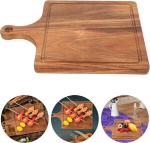 rectangular acacia wood cutting board with handle and juice groove for chopping, serving and food presentation