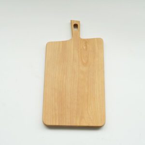 Rectangular beech wood charcuterie board with a hanging handle, designed for serving fruit, steak, bread, olives, cheese, and appetizers in home kitchens and dining settings