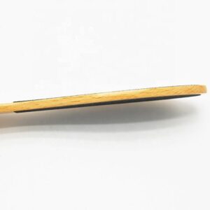Double-faced wooden pedicure foot scrub with sandpaper surface for callus removal and smooth feet care.