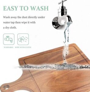 rectangular acacia wood cutting board with handle and juice groove for chopping, serving and food presentation