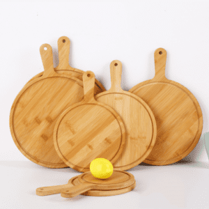 round bamboo pizza board with paddle handle and juice groove for serving pizza, cheese, bread and appetizers
