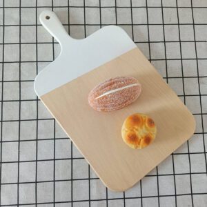 Two solid beech wood cutting boards with handles, ideal for slicing fruit, bread, and pizza, suitable for home baking, kitchen prep, and serving