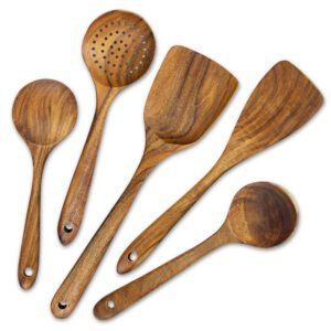 Set of five natural acacia wood kitchen utensils including spatulas, slotted spoons, and stirring tools, designed for non-stick cookware and home cooking