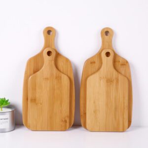 small bamboo chopping board with rounded handle and hanging hole for serving and cutting food