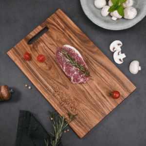 Set of three acacia wood chopping boards with handles, American dark walnut style, suitable for cutting, serving, and kitchen prep