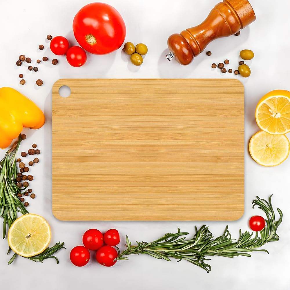 rectangular bamboo cutting board with hanging hole for chopping vegetables, fruits, and meat