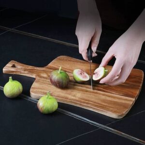 Rectangular acacia wood cutting board with handle, ideal for serving cheese, charcuterie, bread, and fruits, suitable for home kitchens and restaurants