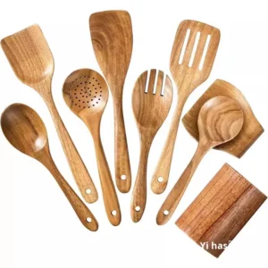 Nine-piece acacia wood kitchen utensil set including spatulas, slotted spoons, soup spoons, rice spoon, and strainer for versatile cooking and serving