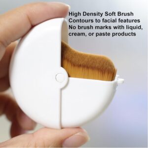 Compact rotating foundation brush with protective cap, featuring dense wavy synthetic bristles for smooth liquid foundation, cream makeup, and face blending application.