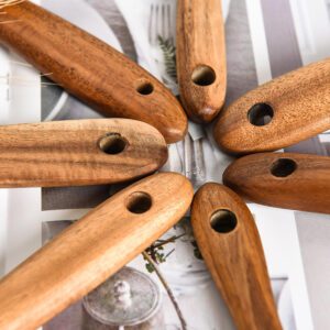Seven-piece teak wood kitchen utensil set featuring cooking spoons, soup ladles, slotted spoon, spatulas, and serving tools designed for non-stick cookware and daily meal preparation