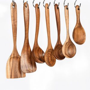 Seven-piece teak wood kitchen utensil set featuring cooking spoons, soup ladles, slotted spoon, spatulas, and serving tools designed for non-stick cookware and daily meal preparation
