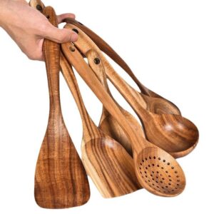 Seven-piece teak wood kitchen utensil set featuring cooking spoons, soup ladles, slotted spoon, spatulas, and serving tools designed for non-stick cookware and daily meal preparation