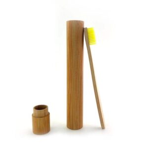 Eco-friendly bamboo toothbrush travel set featuring a biodegradable bamboo toothbrush and reusable bamboo storage case, ideal for travel, camping, and daily oral care