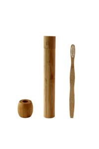 Eco-friendly bamboo toothbrush travel set featuring a biodegradable bamboo toothbrush and reusable bamboo storage case, ideal for travel, camping, and daily oral care