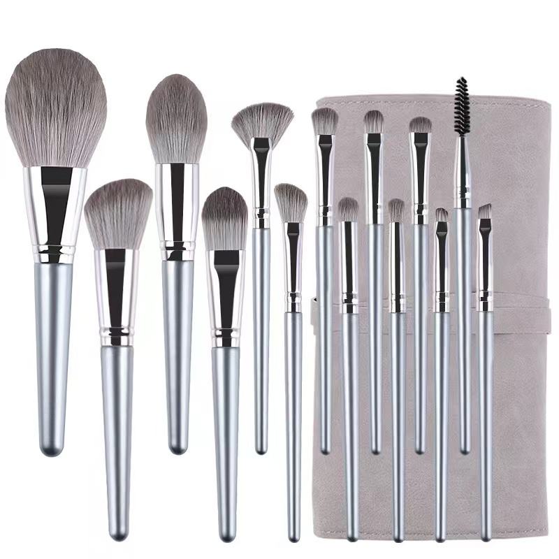 14-piece synthetic hair makeup brush set with champagne silver handles, including face brushes, eye shadow brushes, powder brushes, blush brushes, concealer brushes, and a portable brush case.